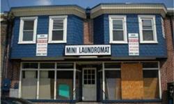 3 unit investment storefront with super visibility on Maryland Avenue. This rare opportunity comes with a 3 bedroom 1.5 bath can rent for $900 per month, a 1 bedroom 1 bath for $600 monthly and 1st floor can be used for either a business or additional