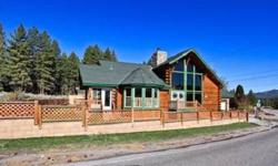 LOG STYLE HOME WITH FANTASTIC SKI SLOPE AND GOLF COURSE VIEWS!!! THIS HOME AFFORDS BEAUTIFUL KNOTTY PINE THROUGHOUT WITH VAULTED CEILINGS, CUSTOM FLOORPLAN, OPEN KITCHEN FOR THE GOURMET COOK, SEPERATE LAUNDRY ROOM WITH LOTS OF CABINETS FOR STORAGE,