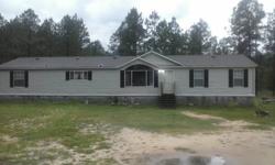 4 bedroom 2 bath doublewide on 5 acres of land for sale!! $50,000 (firm)!! Its a 2001 Fleetwood Hickory Hill, its 26x72 & 1872 square feet! It has a fireplace, VERY spacious, master bedroom has been just recently been remolded (paint & carpet), master