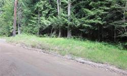 5 acres level and wooded parcel off County Road in Hope. Less than a mile from Highway 200. Power and phone are in the street. Buyer to install well and septic systems.Listing originally posted at http