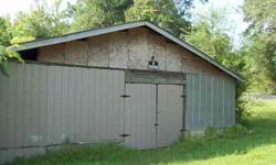 Country setting! City schools, located on nearly an acre, CH&A, large rooms and a barn.Listing originally posted at http