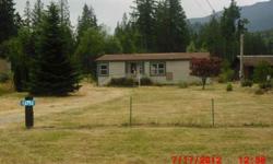 Bring your cash or rehab loan to this manufactured home in Concrete, close to Skagit River, beautiful Mt scenery abound. This lot and home have great potential. Manu home on lot is 1215sq ft, three bed & 1.75 bath. Lot is 24,810sq ft recangular flat lot.