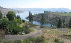 This parcel has unbelievable views of Lake Roosevelt and the sounding bluffs. 2.917 acres with water, power available and leveled site to build that dream home. No CC&Rs so you can bring your camp trailer to enjoy the views or build that dream