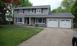 Totally Renovated 5 Bedroom 3.5 bath home on a 1/2 acre lot