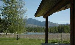 Perhaps the Best Pure River Setting on the market today. The Methow River wraps around this private ranch & the house plays to the view wonderfully, looking down a very long stretch of water framed by Signal Peak. Classic green meadow surrounds home,