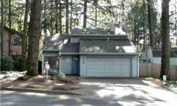 Well established wooded neighborhood with home built among mature fir trees. Easy access to I-5. This custom home has great natural lighting, newer hardwood flooring & paint throughout. Front room & kitchen feature an open floor plan. Master bedroom