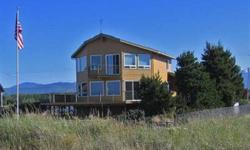 You have earned it! A spectacular NO BANK WATERFRONT home on Dungeness Bay. This home is priced to move and has unobstructed Olympic Mts. view too. Keep your small boat on the beach; and get your share of Dungeness Crabs in minutes. This home is a bird