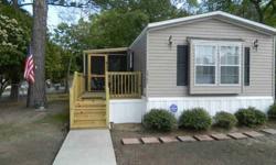 2004 Mobile/Manufactured Home in great condition. 16 x 76, 3 BR, 2 full BA, 8 x 30 (+/-) new Screen Porch/Deck, 8 x 10 storage building and nice lakefront landscaped corner lot with 20 x 20 concrete parking pad. All appliances including washer and dryer