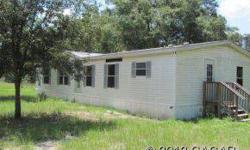 NEWLY RENOVATED 2007 doublewide 3 bedroom, 2 bath with over 1400 sq ft of living on 5 acres with owner financing available! Close to Suwannee River for great fishing and boating with an easy commute into Gainesville. Call today for financing details and