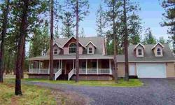Charming custom country home on 3.4 acres in the pines, with room for your horses. Three bedrooms plus bonus room with full bath. Large 'toy storage' building for motor home, RV, etc. and two-car garage. Close to downtown Sisters in a very desirable