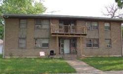Remodeled in last 10 years, 8 unit solid brick building near downtown Elgin close to everything. Chance to make good income off property. All 8 units are currently rented for $650 a month each. Also has parking lot in rear for parking, full basement with