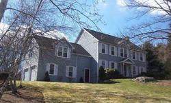 Beautiful home in Wrentham Village set privately on a corner 3 acre lot! Parson style colonial features