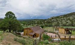 Beautiful 14+air conditioning mountain property overlooking the rio vallecitos north of santa fe.