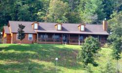 A Sight to SEE!3BD/2BTH Ranch Style Home on 7.61+/- Acres.Beautiful Cedar Log Siding,3car xtra lg(700ft)garage.3roof dormers w/lighting,steel doors,flood lights,60'screened porch/fans&speakers,vaulted ceiling t&g,hardwood floors,mirrored lvg room