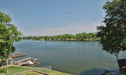 Ready for Summer? This property offers spectacular views of the lake, a boat dock with electric lift, and a jet ski ramp just waiting for your enjoyment. Located on the Colorado Arm of Lake LBJ it has 67 ft of open water and room for entertaiing and