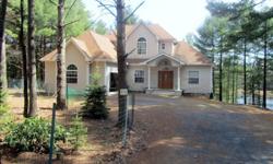 For sale by owner LAKEFRONT Custom Made 3-story home built in 2007in Poconos, 80 miles from Canal St, NY