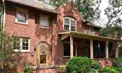Charming 1930's Grove Park two-story brick traditional. Beautiful wood trim detail, 9-foot ceilings and hardwoods throughout. Separate brick 2-car garage with unfinished studio space above for additional storage or future apartment. Enjoy the neighborhood