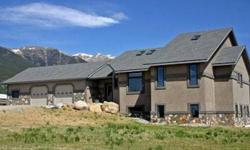 *** 3% Assumable Loan! ***
This ICF construction, high performance, energy efficient home has views of the Collegiate Peaks mountain range, the Sangre de Cristos and Buffalo Peaks. It has custom cabinetry and granite counter tops throughout. In floor