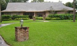 A circular driveway, lovely landscaping and brick fountain lead to this spacious 3 bedrooms, 3 baths and 2 half baths pool home. The sunk-in formal living room features French doors and transom windows that overlook the covered patio and pool. The formal