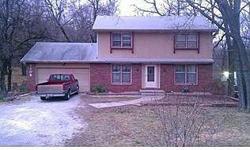 Home is structurally sound, AC and Heating are energy efficient newer models. Needs updating/remodeling, finishing, basically, some ole fashion TLC. Large yard with creek run off lending a country feel. Wooded view from the back. Needs deck built, and
