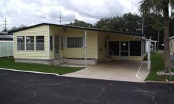 REDUCED! This furnished 2 bedroom/2 bath double-wide mobile home is located in the popular Spanish Trails Village. It is being sold comfortably furnished and ready for its new owners. It has two comfortable bedrooms, both with walk-in closets. And of