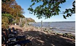 Romance of the Renaissance lives here in this authentic riverfront "Classico Mansion". Escape to serenity in this two bedroom condominium (one of only seven), on four private acres of breathtaking property and sandy beach upon the banks of the Hudson