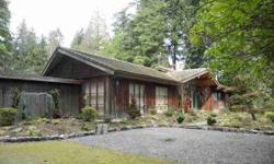 Rare opportunity to acquire a mid-century home on an almost 2.5 acre site in Woodway Park. Old forest growth surrounds the hilltop clearing where home sits. Potential large buildable footprint available should someone wish to rebuild in this beautiful