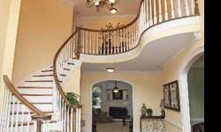 Custom Built, all brick home filled with details not often found. Beginning the presentation in this home a 2-story foyer with beautiful circular staircase, palladium windows, transoms and arched doorways. Continue with light, bright and open spaces