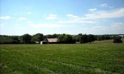 Located just outside Midway, Kentucky is a graceful expression of equestrian farmette with beautiful views and excellent amenities. The farm features a very spacious and well renovated home featuring four bedrooms and 3.5 bathrooms. The dramatic vaulted