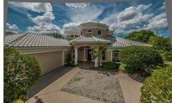 Exquisite Alvarez estate built home with great curb appeal on inside corner lot in the Bayou Club. Dramatic entry with circular staircase. Master and den/library down, upstairs there are 2 bedrooms w/ jack n jill bath and and an additional loft up as well