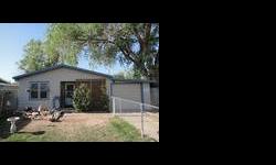 This is a great home with two bedrooms, a full bath, and a one car garage. This is a Great starter home or investment property. This home is well taken care of and has central heat and air. It also includes a Fenced yard and storage buildings with large