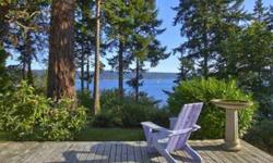 Beautiful & unique Craftsman style cottage w/Mt. Rainier & Puget Sound views & lovely trail leading to 186' of low bank waterfront. Artistically remodeled w/Italian light fixtures, new kitchen w/porcelain tile & hardwood flr & large deck that wraps around