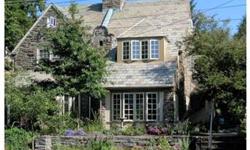 Picture perfect Cotswold style 1920's stone and stucco twin with sunny exposure located in Carpenter Woods section of West Mt Airy. Recipient of Preservation Alliance 2010 Homeowner Award of Recognition for exterior renovation. Lovingly maintained &
