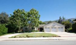 Great home in North La Verne with good curb appeal. an inviting double door entry leads you to an open living room with a fireplace and a dining area. Remodeled kitchen with granite countertops and eating area that opens to the family room. Spacious