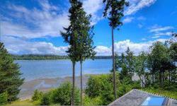 Gorgeous South Sound waterfront home on the shores of Totten Inlet. Luxurious yet unpretentious? in nature this custom home offers 3800 SF of living on 150' of unbelievable? sandy beach with lawn right down to a short stairway to your own beach paradise.