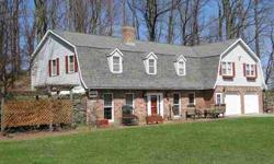 Gentleman's Horse Farm on 8.17 rolling acres. This 27 year old Dutch Colonial offers 4-5 bedroom 2.5 bath, in-ground pool, brick patio, 3 barns, with automatic watering systems (heated) main barn currently has "standing" stalls with plenty of room for 5-6
