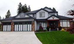 Incredible two story custom quality craftsman situated on a private +/- half acre lot. Amazing updates throughout home (190K). Boxed beam dining rm ceiling & spectacular solid wood wainscoting. Granite kitchen island & counters with stainless steel