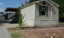 Nice mobile home on its own lot, fenced yard. Needs some touch-up work and would be a great home.HUD Owned Property are sold in AS-IS condition. All offers are submitted online at https