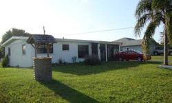 Active with Contract. Short Sale. Bank Approved Price. Excellent buy in Peace River Shores. Nice rural area but just a short drive into Punta Gorda. This home is situated on 2 lots with almost 1/2 acres of land. Large detached garage with workshop. The