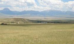 Beautiful corner lot with good grass; spectacular views of madison range, the valley and the madison river.