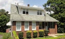 Brick 1.5 story with 3 bedrooms, 2 baths, living room, kitchen, sun room, upstairs kitchen, covered front porch and a one car integral garage. At one time used as a duplex. Easily converted back to single family home.Listing originally posted at http