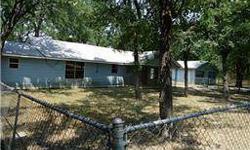 Darling country setting on the 3 bedroom 2.5 bath home. Home has a spacious floor plan HVAC, carpet, vinyl flooring, fireplace, fenced yard. Nice tree shaded lot with covered parking and front patio. All this on 1.37 Acres. This property is a forecloser