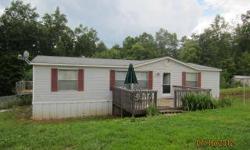 West Marion/Sugar Hill area-Giles 1998 doublewide on .60+/- acres. Home has 3 bedrooms, 2 baths, large living room with laminate wood floors, eat in kitchen, front & back decks along with a fenced in backyard. Directions