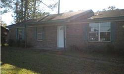 The bones are here to make this your family's new home! Seller has had the walls freshly painted. All that is needed is a little TLC and this 3/2 brick is all yours! Location is extremely convenient! In addition to the living room, there is also a HUGE