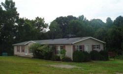 1996 MANUFACTURED DBLWD ON 2.19 ACRES. PLEASANT SETTING. ABOVE GROUND POOL REMOVED. IN NEED OF SOME UPDATES BUT HAS LOTS OF SPACE FOR THE $. SOLD IN AS-IS CONDITION. ALL STATS FROM PUBLIC RECORD TO VERIFIED BY BUYER/ AGENT.Listing originally posted at