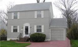 Center hall colonial close to school, pool, tennis, parkland and NYC transportation. The bright eat in kitchen has a center isle loads of cabinet & pull out drawers, a seperate work area with a desk, and a large picture window overlooking a pretty