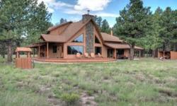 Looking for spacious luxury in the pines to get away from the rat race? This beauty awaits you on almost ten acres of gorgeous ponderosa. Home was remodeled in 2005 with many upgrades including wood floors, stone fireplaces, new cabinets, granite