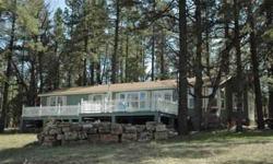 HOME IS 3 BEDROOMS 2 BATHS 16500 SF. LARGE BACK DECK THAT LOOKS UP AT THE MOGOLLON RIM THERE IS 2.7 ACRES AT 6200 FEET ELEVATON IN THE TALL PINES CLOSE TO 7 LAKES AND 5 CREEKS.JUST BELOW THE MOGOLLON LOTS OF DEER,ELK.ALSO 6 NIGHTLY OR FAMILY H-WAY CABINS
