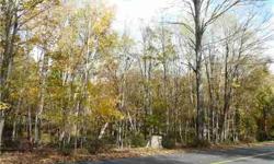Beautiful wooded land estimated to yield 15 building lots. Rolling topography with stone walls and road frontage (approx.). Located near several developed subdivisions. Five minutes from shopping, schools & I-84. First time offered. Abuts 200 ac town