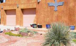 Custom southwestern home with sweeping views and a modern flair.Listing originally posted at http